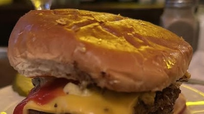 A burger, and a martini, at JG Melons.