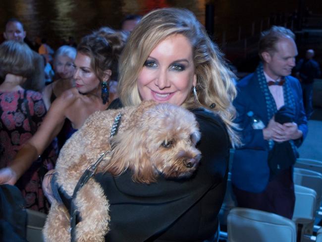 Barrister Gina Edwards and Oscar the cavoodle. Ms Edwards has launched defamation proceedings against A Current Affair over their reporting of a custody dispute involving Oscar. Picture: Supplied