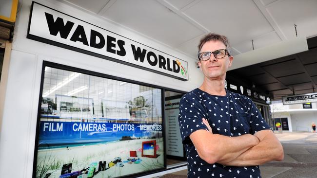 Wade Kelleher from Wades World Photographics in Coolangatta is meeting customers from the Northern Rivers who can't cross the Queensland-NSW border at Tweed Heads South to deliver their orders. Photo: Scott Powick Newscorp