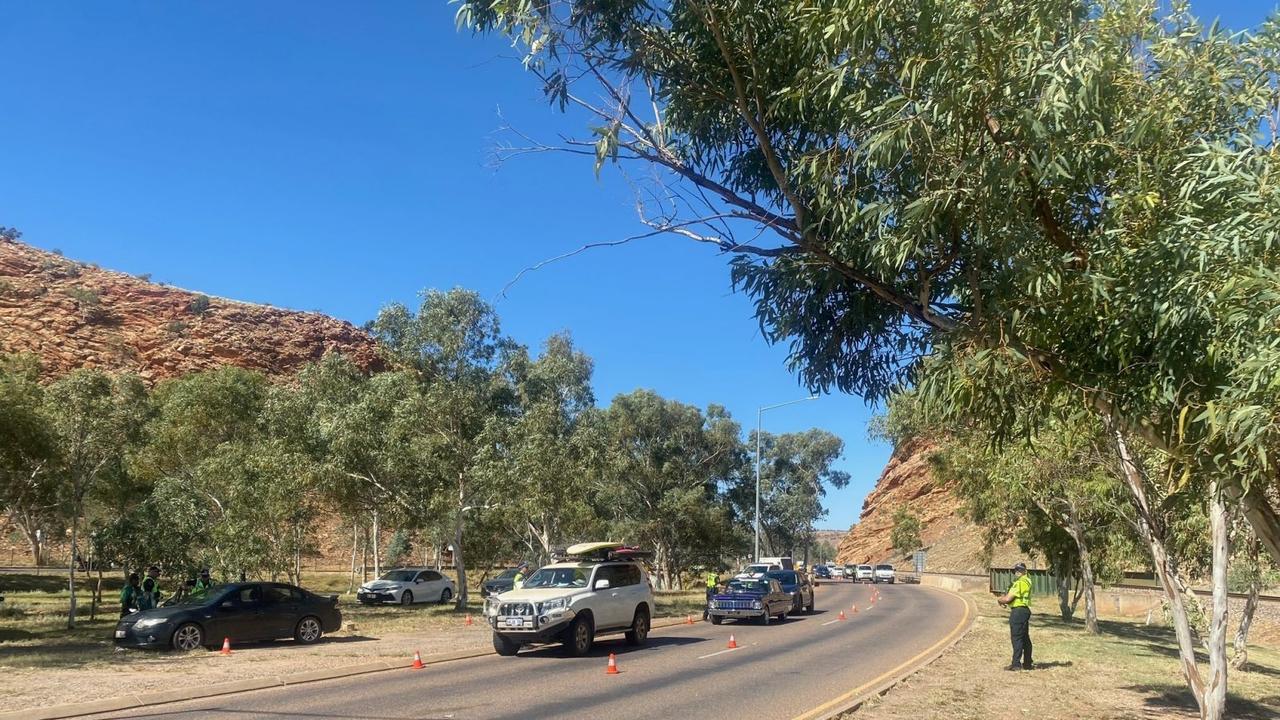 Northern Territory Police’s southern road policing unit conduct a random breath test on Stuart Highway during Red CentreNATS 2024. Picture: NT Police
