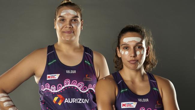 Firebirds Indigenous players Donnell Wallam (left) and Jemma Mi Mi model the club's First Nations dress. Photo: Queensland Firebirds