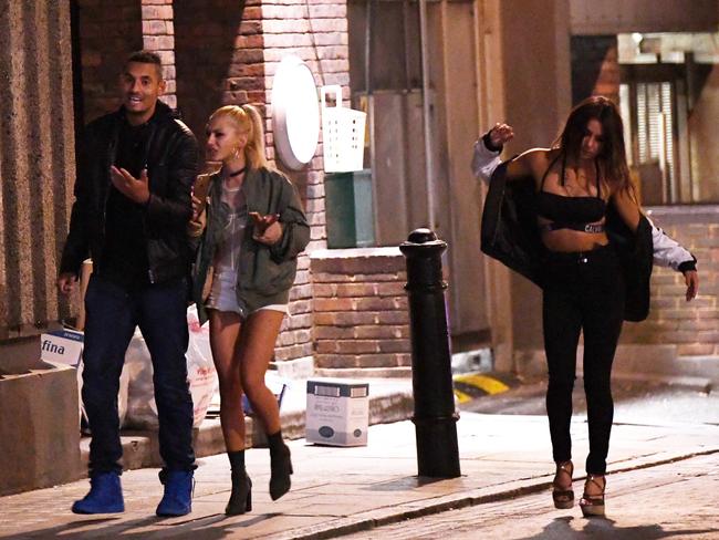 Kyrgios walks with the girls. Picture: BACKGRID