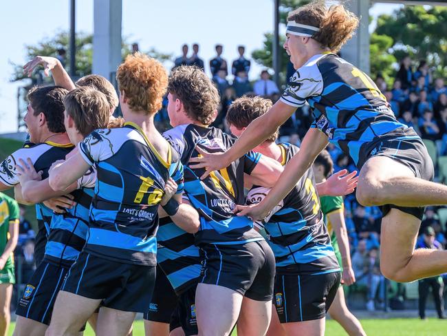 The All Saints Maitland senior rugby league side celebrating during their 38-12 victory over Hunter Sports High in round two of the 2023 Peter Mulholland Cup. Picture: supplied