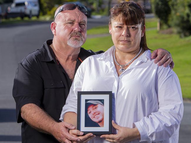 Brett and Belinda Beasley with a photo of son Jack