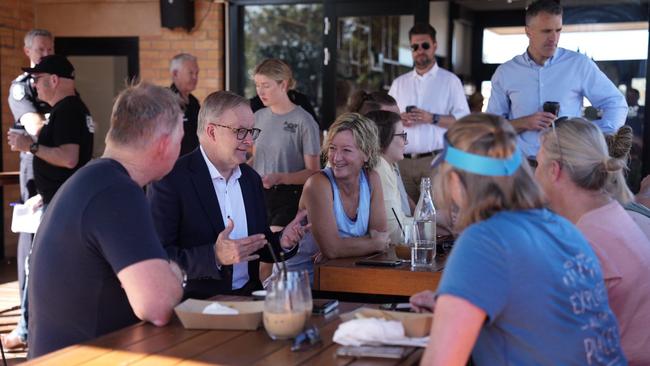 Prime Minister Anthony Albanese in Renmark by the Murray River in Riverland, South Australia. , , Dropped into Arrosto Coffee in Renmark with , @PMalinauskasMP, and , @TonyPasin, to meet locals and small business for the awesome coffee, Callum., Picture: Twitter/ Anthony Albanese.