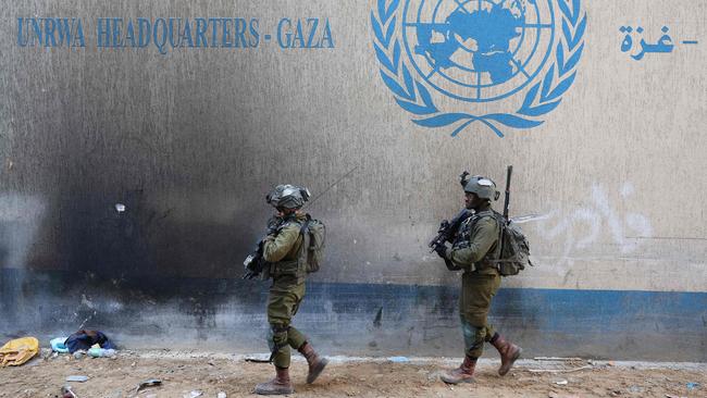 Israeli soldiers inside a compound of the United Nations Relief and Works Agency for Palestine Refugees (UNRWA) in the Gaza Strip. Picture: Jack Guez/AFP