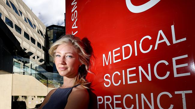 Kate Andrewartha, 24, of Taroona, outside the Menzies Institute for Medical Research, had to move to Melbourne to study physiotherapy. Picture: SAM ROSEWARNE