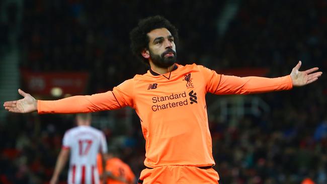 Mohamed Salah celebrates. / AFP PHOTO / Geoff CADDICK