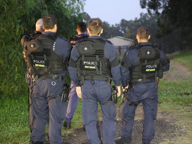 Alcohol, a bar, bikie colours and paraphernalia were seized during the police operation.