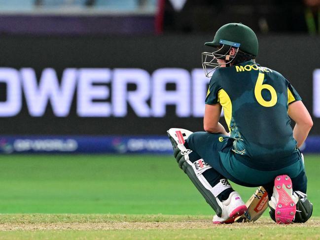 Australia's Beth Mooney reacts after her dismissal during the ICC Women's T20 World Cup cricket semi-final match between Australia and South Africa at the Dubai International Cricket Stadium in Dubai on October 17, 2024. (Photo by Giuseppe CACACE / AFP)