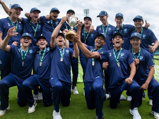 NSW Metro players with the spoils of victory after winning the under-17 national championships final against Queensland on Thursday. Picture: Linda Higginson/Cricket Australia (EDITORIAL USE ONLY)