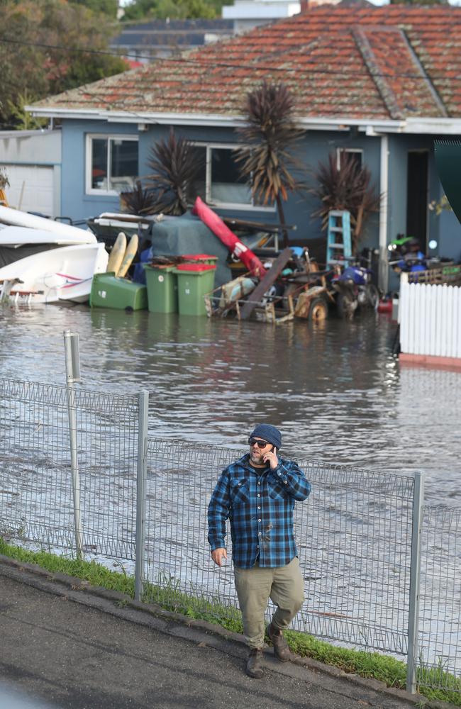 A Maribyrnong resident outside a flooded property. Picture: NCA NewsWire/ David Crosling.