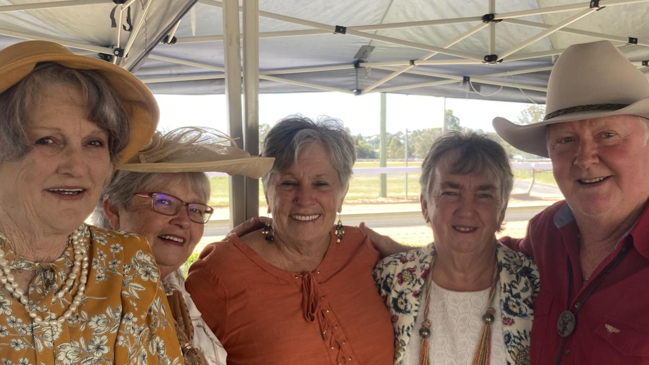 Karyn Palmer, Bev Evans, Del Grant, Donna Ross, and Stephen Thoday enjoy a day of fun at the Gympie Races on Saturday, July 15, 2023.