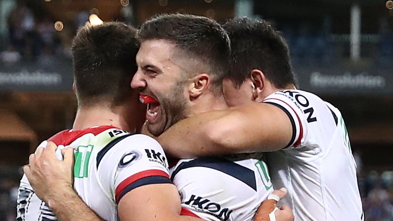 James Tedesco of the Roosters celebrates scoring a try.