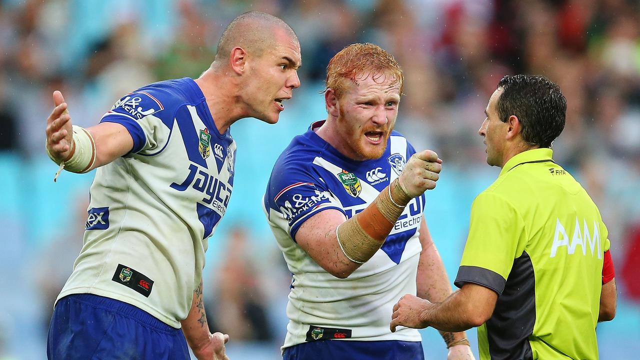 James Graham and David Klemmer confront Gerard Sutton after he awarded South Sydney a penalty.