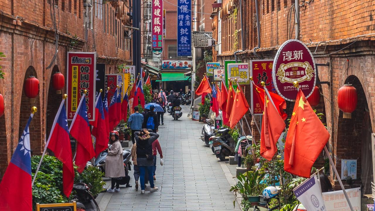 Taiwanese and Chinese flags on a street in Kinmen. The island has always been more cordial with mainland China due to its proximity.