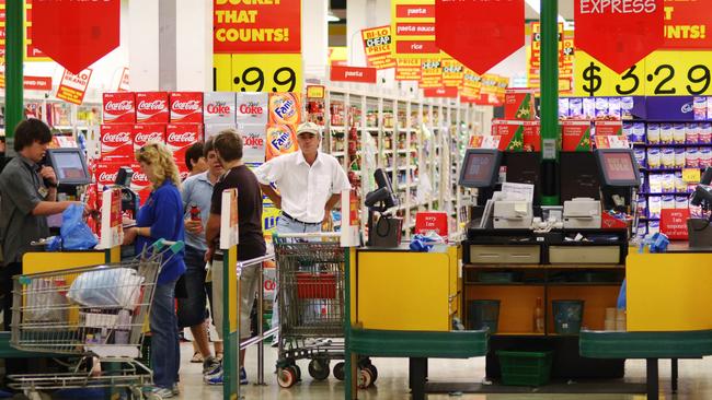 Union officials say workplaces with high concentrations of young people, like supermarkets, should require police checks. Picture: AAP