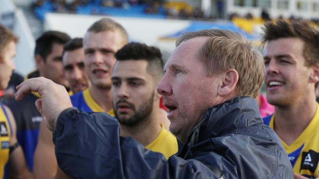 Andy Collins works the Williamstown huddle. Picture: Stuart Milligan