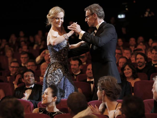 Nicole Kidman dances with French actor and Master of Ceremony Lambert Wilson during the opening ceremony for the Cannes Film Festival.