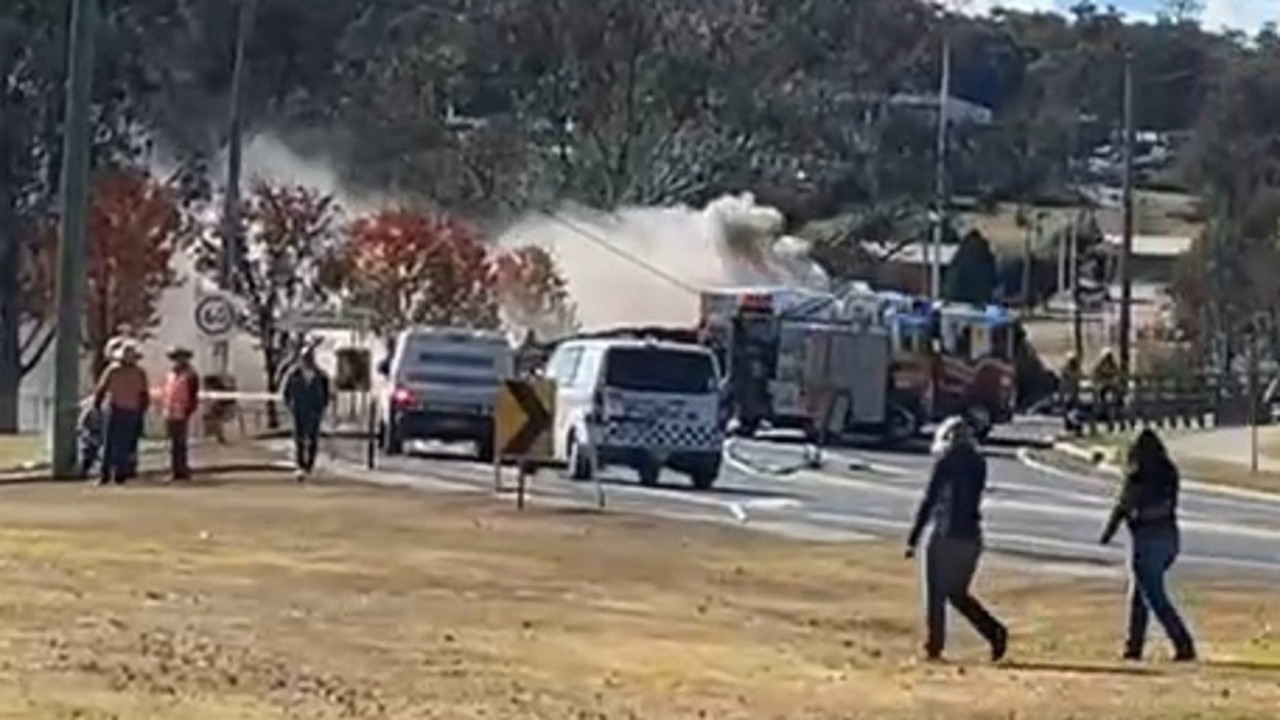 A cattle truck has rolled and caught fire on Albion Street in Warwick, leaving livestock needing to be herded. Photos courtesy of Ali Yusuf.