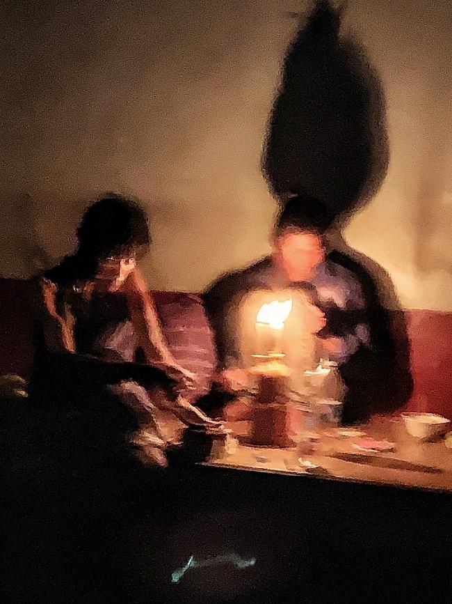 Tachileik addicts inject by candlelight. Picture: Conor Woodman