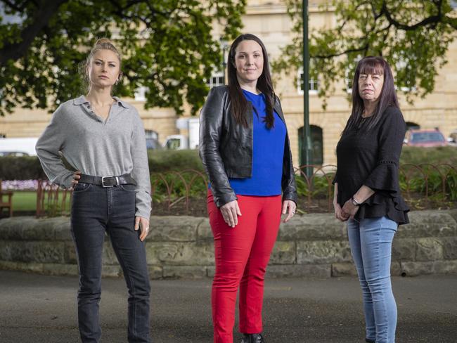 WARNING - IDENTITY OF TAMEKA (BLACK TOP) MUST NOT BE RELEASED WITHOUT EXPRESS EDITORORS APPROVAL. ALICIA USED AS NAME.Let her speak (#letherspeak) campaigners and survivors of sexual abuse Grace Tame and Alicia with journalist Nina Funnell (centre) in Hobart. Picture: RICHARD JUPEWARNING - IDENTITY OF TAMEKA (BLACK TOP) MUST NOT BE RELEASED WITHOUT EXPRESS EDITORORS APPROVAL. ALICIA USED AS NAME.