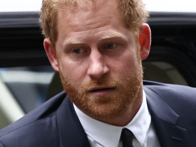 Prince Harry was hacked in between 2003 and 2009 by Mirror Group Newspapers, a court has ruled. (Photo by HENRY NICHOLLS / AFP)