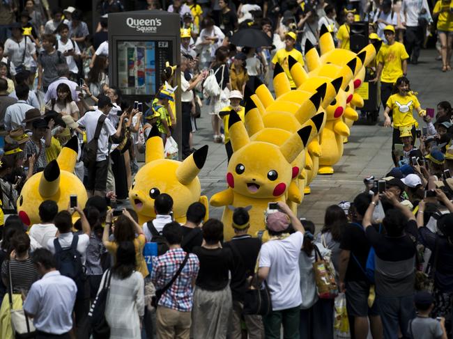 Performers dressed as Pikachu, a character from Pokemon series game titles, march during the Pikachu Outbreak event hosted by The Pokemon Co. on August 9, 2017 in Yokohama, Kanagawa, Japan. A total of 1, 500 Pikachus appear at the city’s landmarks in the Minato Mirai area aiming to attract visitors and tourists to the city. The event will be held through until August 15. Picture: Tomohiro Ohsumi/Getty Images