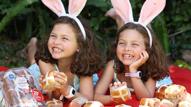 Lily and Rose Kyriakakis (DO NOT PUBLISH LAST NAME) , From DEC 27 the supermarket will donate 20 cents to Redkite from the sale of every six and nine pack of, Coles Brand hot cross buns until 2 January, including customer-favourite traditional fruit buns, as well as, chocolate, apple and cinnamon, fruit-free and traditional mini fruit buns priced from just $4.50 each or two, packs for $7.,