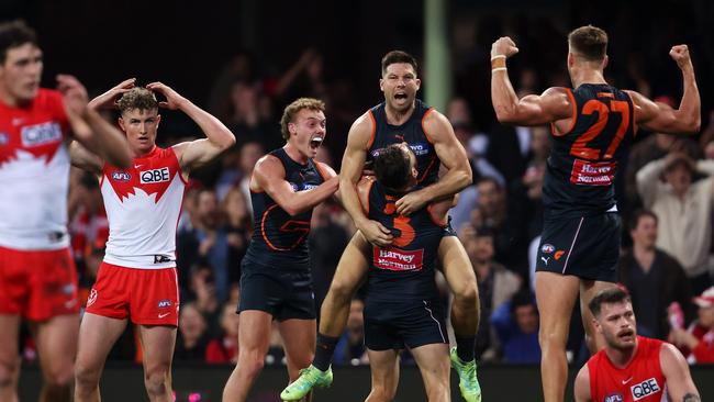 Giants players celebrate Greene’s late goal. (Photo by Mark Kolbe/AFL Photos/via Getty Images )