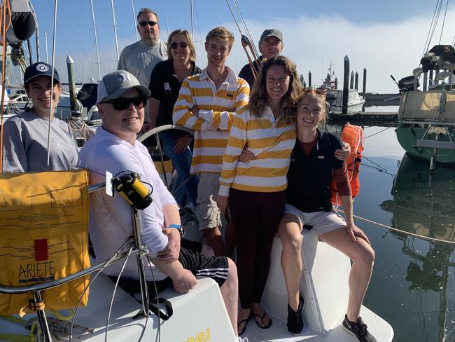 TIGHT CREW: Sundowner crew Cass Olive, Matt Bugg, Pat Hyman, Lisa Guy, Tom Stearnes, Mike Hutchison, Alice Grubb and Grace Stearnes before the start of the Launceston to Hobart yacht race on Tuesday.