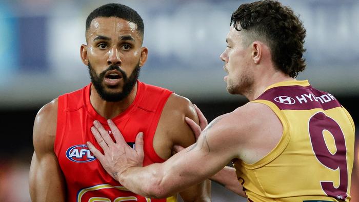GOLD COAST, AUSTRALIA - JULY 29: Touk Miller of the Suns and Lachie Neale of the Lions in action during the 2023 AFL Round 20 match between the Gold Coast SUNS and the Brisbane Lions at Heritage Bank Stadium on July 29, 2023 in Queensland, Australia. (Photo by Russell Freeman/AFL Photos via Getty Images)