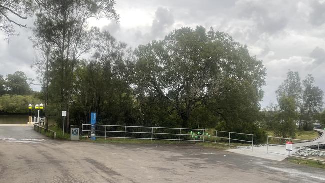 Signs warning fishers not to eat their catches taken from Logan River. Picture: Judith Kerr