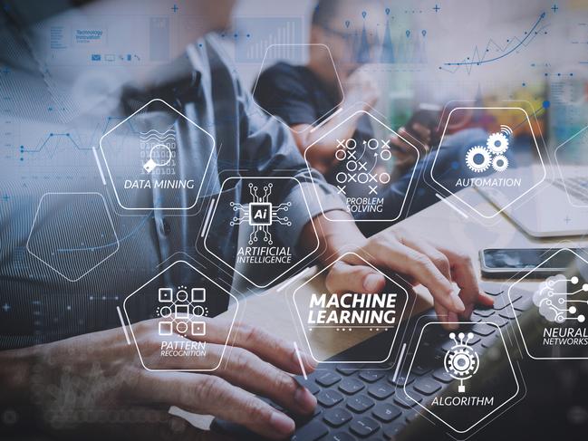 *HOLD FOR Carolyn Dominic* Machine learning technology diagram with artificial intelligence (AI),neural network,automation,data mining in VR screen.Coworking process, entrepreneur team working in creative office space using digital tablet. .Picture: istock