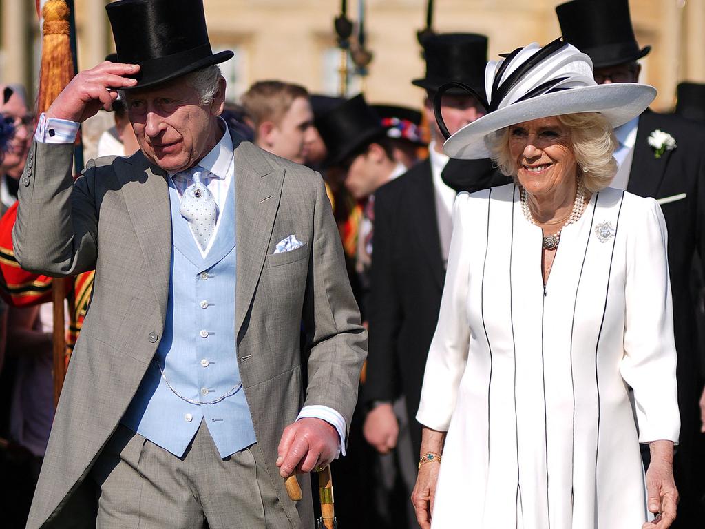 Britain's King Charles III and Britain's Queen Camilla attend a Royal Garden Party at Buckingham Palace, central London, on May 8, 2024. Picture Jordan Pettitt/POOL/AFP