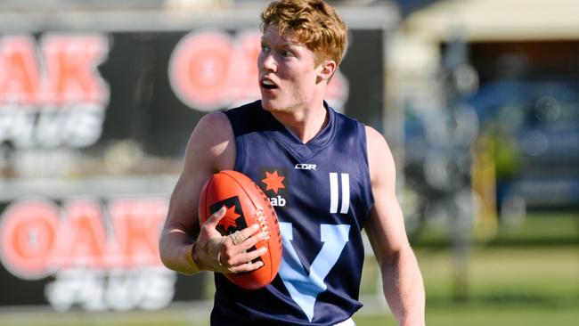 Matthew Rowell playing for Vic Metro.