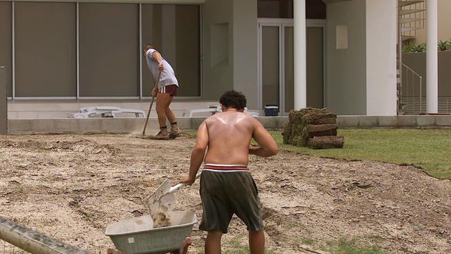 Workmen were snapped by the Bulletin laying turf outside one of the Hedges Ave mansions in 2003.