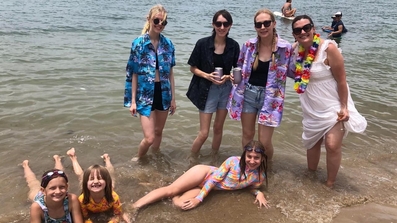 Imogen (far left) and Lauren Murphy (far right) enjoy Christmas celebrations with Maye, Alys, Aari, Jacinta and Taryn Beutel at Cotton Tree Park. Picture: Laura Pettigrew.