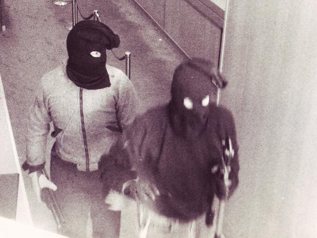 Two floppy-masked bandits with a sawn-off shotgun made off with $100,000 in a Balwyn bank robbery in 1987.