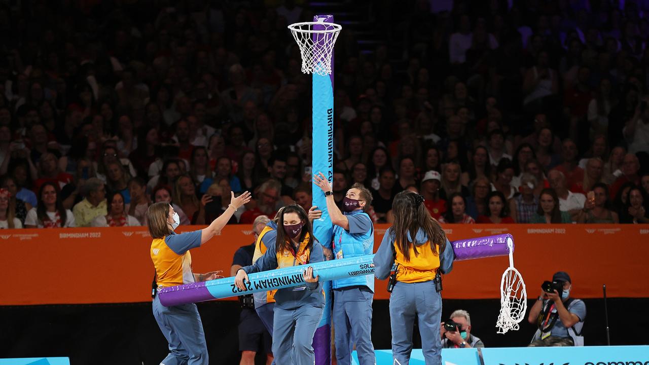 The net post is replaced after Layla Guscoth crashed in hard. Photo by Mark Kolbe/Getty Images.