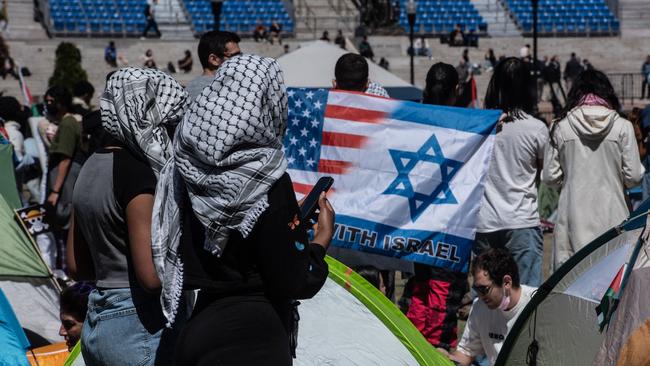 A pro-Israeli student stands in a pro-Palestinian encampment on Columbia University campus. Picture: Getty Images/AFP