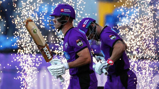 Hurricanes D'Arcy Short, left, and Matthew Wade walk out to bat in BBL08. Picture: Scott Barbour/Getty