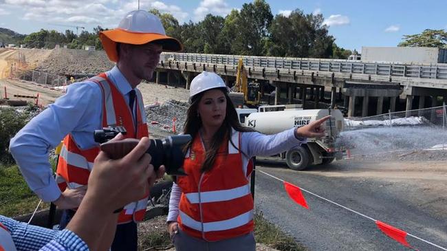 Transport Minister Mark Bailey and Gaven MP Meaghan Scanlon with transport staff on a site tour of M1 upgrades.