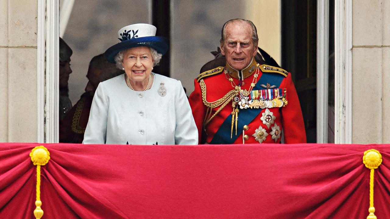 The Queen and the Duke of Edinburgh on Buckingham Palace’s balcony in 2014. Picture: Leon Neal/AFP