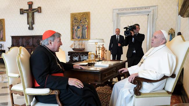 Pope Francis talking with Australian Cardinal George Pell during a private audience at the Vatican.Picture: VATICAN MEDIA / AFP