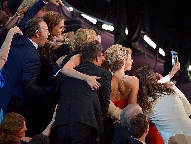 Kevin Spacey, Angelina Jolie, Julia Roberts, Brad Pitt, Jennifer Lawrence, Ellen DeGeneres and Jared Leto gather for an Oscars selfie.