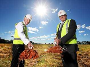 NSW Health Minister Brad Hazzard and Tweed MP Geoff Provest turn the first sod of dirt at the new Tweed Valley Hospital site. Picture: Scott Powick