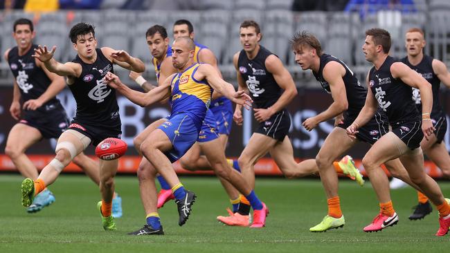 West Coast’s Dom Sheed gets a kick away during the Eagles’ 22-point win over Carlton. Picture: Getty Images