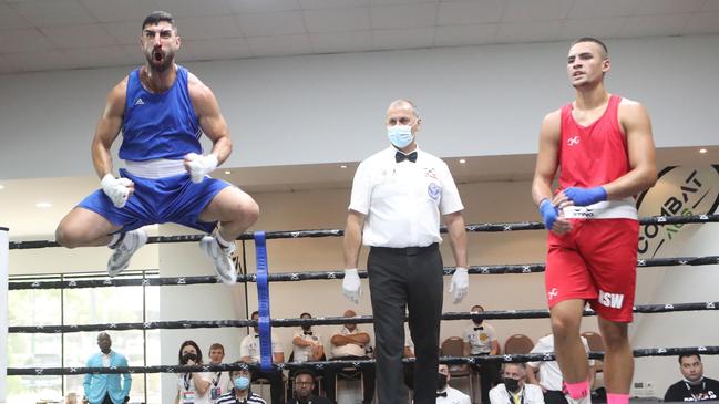 Coumi celebrates after winning through to the Commonwealth Games over his NSW opponent. Picture: Edgardo Coumi