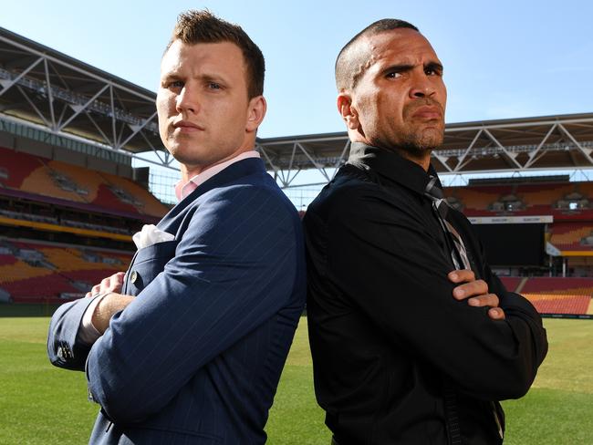 Australian boxers Jeff Horn (left) and Anthony Mundine pose for photos after a press conference at Suncorp Stadium in Brisbane, Wednesday, October 10, 2018. The two will clash in a catchweight fight at Suncorp Stadium on November 30. (AAP Image/Dan Peled) NO ARCHIVING